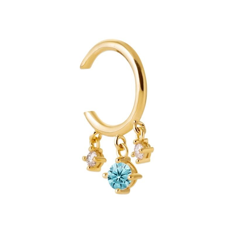 bague d'oreille et pierre bleue