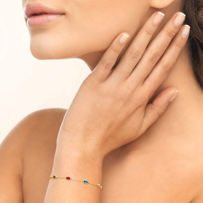 Bracelet multicolore pour femme, plaqué or & Swarovski, porté par une femme