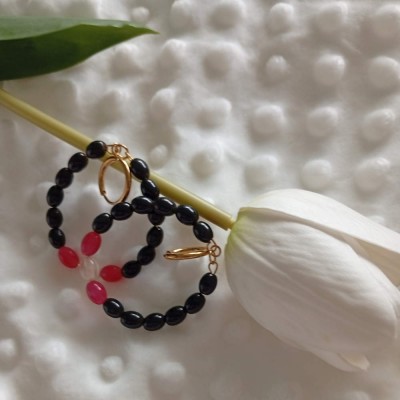 boucles d'oreilles originales et coloré en rose et noir