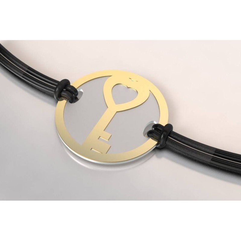 Bracelet créateur original Clef acier gris et or jaune Bracelet créateur original Clef acier gris et or jaune